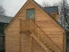 A timber framed garden office with timber cladding